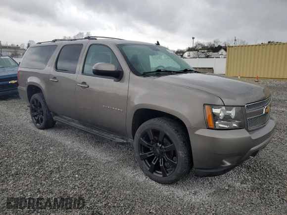2013 Chevrolet Suburban LT with VIN 1GNSKJE77DR131188, listed as a Copart auction lot 52880375 with 147,278 mi miles and Salvage Title. Bid and sale history available at DreamBid. Image 4.