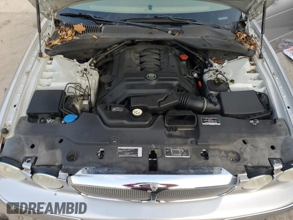 2004 Jaguar XJ with VIN SAJEA74C64SG08121, listed as a Copart auction lot 81736984 with 100,144 mi miles and Non Repairable. Bid and sale history available at DreamBid. Image 11.
