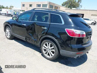 2011 Mazda CX-9 Grand Touring with VIN JM3TB2DV1B0300682, listed as a IAAI auction lot 42702969 with 195,068 mi miles and . Bid and sale history available at DreamBid. Image 3.