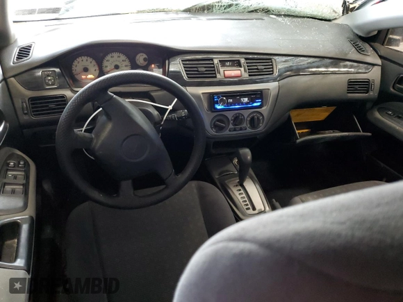 2004 Mitsubishi Lancer z VIN JA3AD29F04U013596, wystawiony jako Copart lot #49725295 z przebiegiem 144 438 mil mil oraz Szkoda całkowita • Salvage title. Historia ofert i sprzedaży dostępna na DreamBid. Obrazek 8.