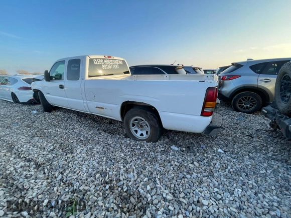 2001 Chevrolet Silverado 1500 LS with VIN 1GCEC19V11E232175, listed as a Copart auction lot 79202904 with 309,623 mi miles and Salvage Title. Bid and sale history available at DreamBid. Image 2.