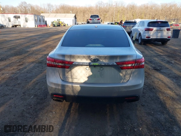 2014 Toyota Avalon Limited with VIN 4T1BK1EB4EU090185, listed as a IAAI auction lot 41715194 with 120,489 mi miles and . Bid and sale history available at carsss.com. Image 16.