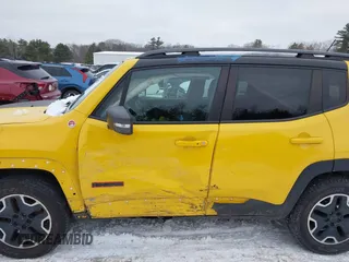 2015 Jeep Renegade Trailhawk with VIN ZACCJBCT9FPB95949, listed as a IAAI auction lot 41558291 with 60,682 mi miles and . Bid and sale history available at DreamBid. Image 14.