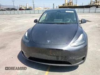 2024 Tesla Model Y Long Range z VIN 7SAYGDEE0RF062395, wystawiony jako Copart lot #55071185 z przebiegiem 42 747 mil mil oraz Szkoda całkowita • Salvage title. Historia ofert i sprzedaży dostępna na DreamBid. Obrazek 14.