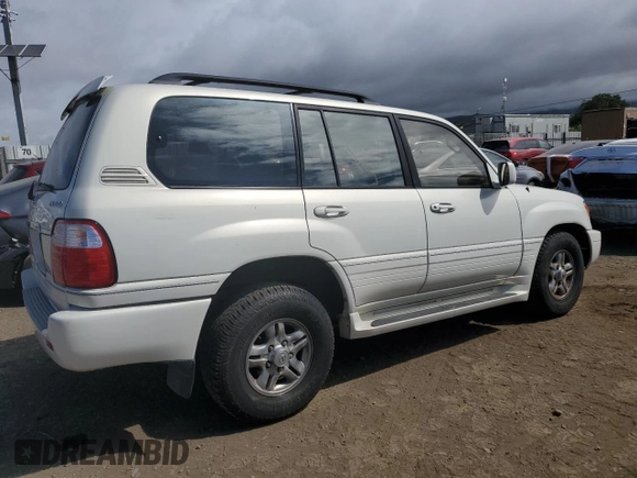 2002 Lexus LX 470 z VIN JTJHT00W423522126, wystawiony jako Copart lot #56582855 z przebiegiem 280 679 mil mil oraz Szkoda całkowita • Salvage title. Historia ofert i sprzedaży dostępna na DreamBid. Obrazek 3.