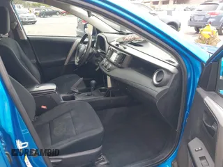 2018 Toyota RAV4 LE with VIN 2T3BFREV6JW740214, listed as a IAAI auction lot 42106349 with 105,831 mi miles and . Bid and sale history available at carsss.com. Image 5.