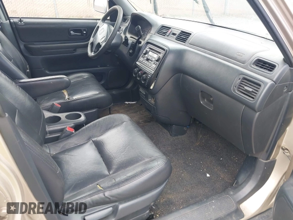 2000 Honda CR-V SE with VIN JHLRD1874YC046995, listed as a IAAI auction lot 42033059 with 218,484 mi miles. Bid and sale history available at carsss.com. Image 5.