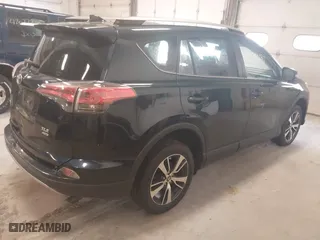 2017 Toyota RAV4 XLE with VIN JTMRFREV6HD208421, listed as a IAAI auction lot 42078130 with 228,365 mi miles. Bid and sale history available at carsss.com. Image 4.