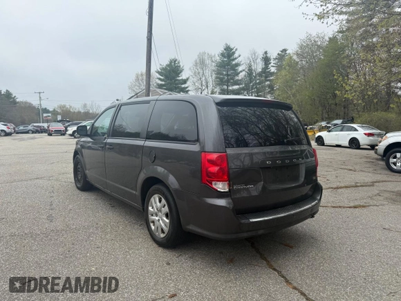 2019 Dodge Grand Caravan SE with VIN 2C4RDGBG2KR718687, listed as a Copart auction lot 55877605 with 199,604 mi miles and Clean Title. Bid and sale history available at DreamBid. Image 3.