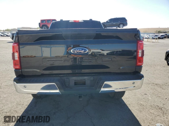 2021 Ford F-150 XL with VIN 1FTMF1E50MKD44349, listed as a Copart auction lot 76947214 with 34,592 mi miles and Salvage title. Bid and sale history available at DreamBid. Image 6.