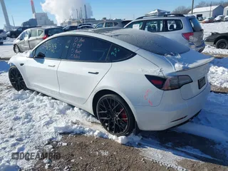 2021 Tesla Model 3 Performance with VIN 5YJ3E1EC1MF063445, listed as a IAAI auction lot 41293243 with 43,143 mi miles and . Bid and sale history available at DreamBid. Image 3.