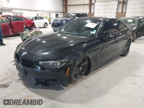 2019 BMW 4 Series 440i xDrive with VIN WBA4J7C57KBM75468, listed as a IAAI auction lot 42205190 with 65,575 mi miles and . Bid and sale history available at DreamBid. Image 2.