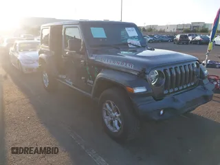 2021 Jeep Wrangler Unlimited Sport S z VIN 1C4HJXDG7MW583315, wystawiony jako IAAI lot #41827899 z przebiegiem 25 264 mil mil oraz . Historia ofert i sprzedaży dostępna na DreamBid. Obrazek 1.