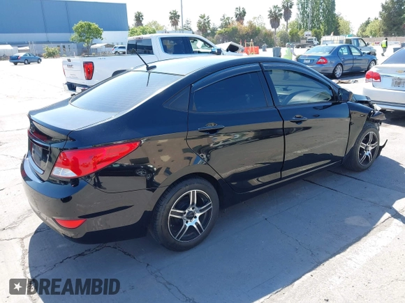 2015 Hyundai Accent GLS with VIN KMHCT4AE8FU936127, listed as a IAAI auction lot 42182291 with 161,828 mi miles and . Bid and sale history available at DreamBid. Image 4.