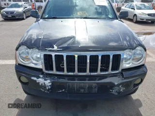 2007 Jeep Grand Cherokee Limited with VIN 1J8HR58N27C594744, listed as a IAAI auction lot 41929390 with 154,140 mi miles and . Bid and sale history available at DreamBid. Image 6.