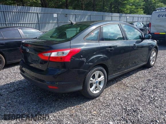 2013 Ford Focus SE with VIN 1FADP3F21DL180199, listed as a IAAI auction lot 42768802 with 125,095 mi miles and . Bid and sale history available at DreamBid. Image 4.