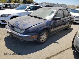 1997 Saturn SL with VIN 1G8ZK5271VZ236940, listed as a Copart auction lot 58689094 with 189,639 mi miles and Salvage title. Bid and sale history available at DreamBid. Image 1.