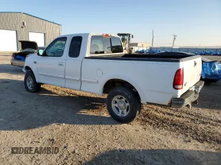 1998 Ford F-150 z VIN 1FTZX18W3WKB01774, wystawiony jako Copart lot #88670315 z przebiegiem 102 301 mil mil oraz Szkoda całkowita • Salvage title. Historia ofert i sprzedaży dostępna na DreamBid. Obrazek 2.