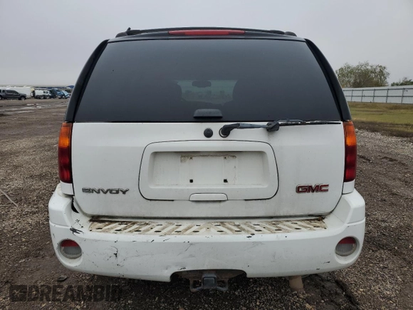 2006 GMC Envoy SLT with VIN 1GKDT13S362345939, listed as a Copart auction lot 85290644 with 173,066 mi miles and Salvage Title. Bid and sale history available at carsss.com. Image 6.