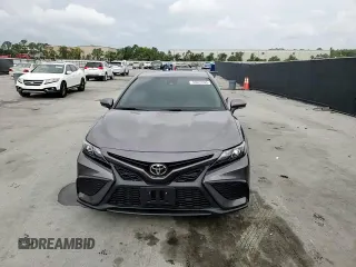 2023 Toyota Camry SE z VIN 4T1T11AK3PU170075, wystawiony jako Copart lot #59023595 z przebiegiem 18 505 mil mil oraz Szkoda całkowita • Salvage title. Historia ofert i sprzedaży dostępna na DreamBid. Obrazek 14.