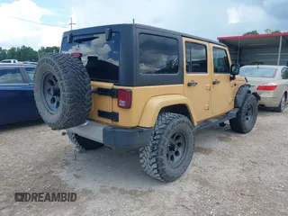 2013 Jeep Wrangler Unlimited Sahara with VIN 1C4BJWEG8DL638404, listed as a IAAI auction lot 42586604 with 43,953 mi miles and . Bid and sale history available at DreamBid. Image 4.