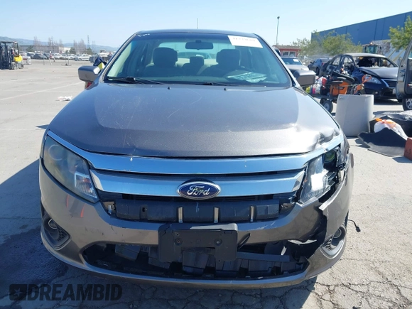 2012 Ford Fusion SE z VIN 3FAHP0HA8CR401382, wystawiony jako IAAI lot #41739680 z przebiegiem 73 404 mil mil oraz . Historia ofert i sprzedaży dostępna na DreamBid. Obrazek 12.