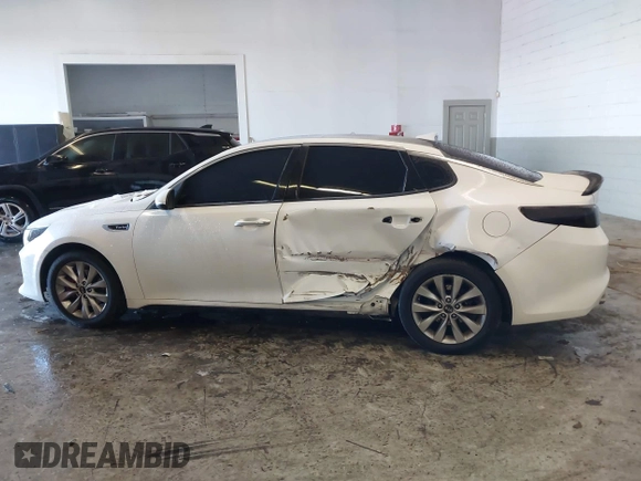 2016 Kia Optima SX Turbo with VIN 5XXGW4L23GG016526, listed as a IAAI auction lot 41428139 with 112,603 mi miles and . Bid and sale history available at carsss.com. Image 14.