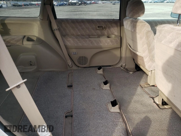 1998 Honda Odyssey with VIN RA31038664, listed as a Copart auction lot 43051785 with 106,084 mi miles and Salvage title. Bid and sale history available at DreamBid. Image 11.