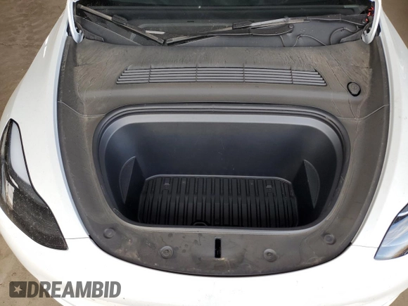 2024 Tesla Model Y Long Range with VIN 7SAYGDEE1RF165311, listed as a Copart auction lot 51711665 with 15,190 mi miles and Salvage Title. Bid and sale history available at DreamBid. Image 12.