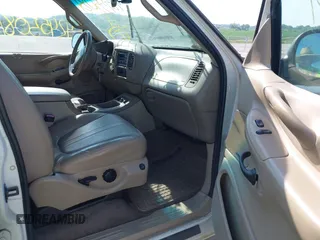 2000 Ford Expedition Eddie Bauer with VIN 1FMPU18LXYLA15330, listed as a IAAI auction lot 42455081 with Not provided miles and . Bid and sale history available at DreamBid. Image 5.