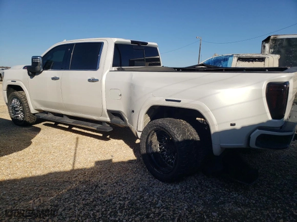 2021 GMC Sierra 3500HD Denali with VIN 1GT49WEY3MF162264, listed as a Copart auction lot 87002814 with 50,454 mi miles and Salvage Title. Bid and sale history available at carsss.com. Image 2.