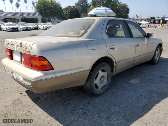 1999 Lexus LS 400 Luxury Sdn with VIN JT8BH28F8X0164627, listed as a Copart auction lot 74565914 with 203,039 mi miles and Clean Title. Bid and sale history available at carsss.com. Image 3.