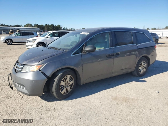 2015 Honda Odyssey LX with VIN 5FNRL5H29FB117569, listed as a Copart auction lot 87870755 with 147,295 mi miles and Salvage Title. Bid and sale history available at carsss.com. Image 1.