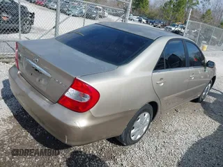 2003 Toyota Camry LE with VIN 4T1BE32K13U787169, listed as a IAAI auction lot 41510710 with 193,197 mi miles and . Bid and sale history available at DreamBid. Image 4.