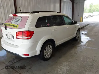 2019 Dodge Journey SE with VIN 3C4PDCBBXKT835029, listed as a IAAI auction lot 42120482 with 130,282 mi miles and . Bid and sale history available at DreamBid. Image 4.