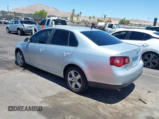 2008 Volkswagen Jetta S with VIN 3VWHM71K58M064797, listed as a IAAI auction lot 42676040 with 211,145 mi miles and . Bid and sale history available at DreamBid. Image 3.