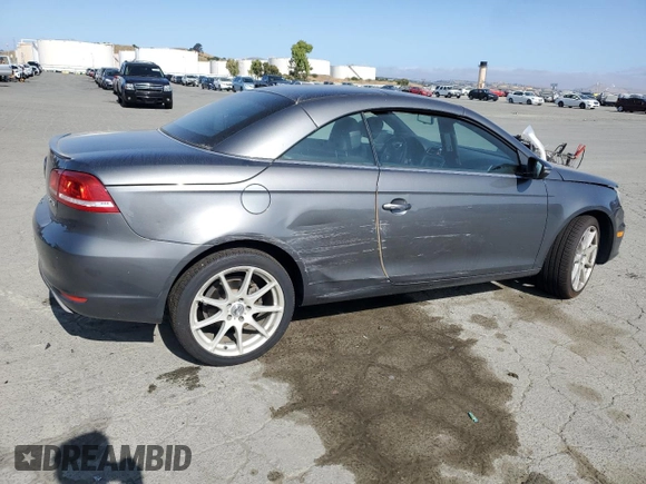 2012 Volkswagen Eos Executive with VIN WVWFW7AH4CV006428, listed as a Copart auction lot 61144685 with 101,514 mi miles and Salvage title. Bid and sale history available at DreamBid. Image 3.