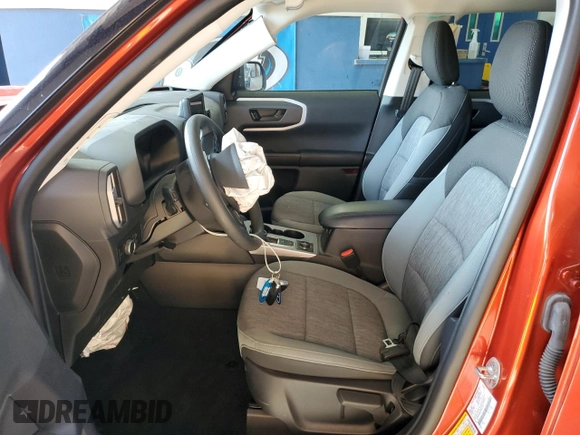 2023 Ford Bronco Sport Big Bend with VIN 3FMCR9B6XPRD64165, listed as a Copart auction lot 60398065 with 8,535 mi miles and Salvage title. Bid and sale history available at DreamBid. Image 7.
