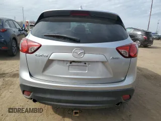 2016 Mazda CX-5 Touring with VIN JM3KE2CY4G0692949, listed as a Copart auction lot 49174645 with 163,912 mi miles and Clean Title. Bid and sale history available at carsss.com. Image 6.