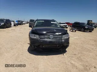 2021 Volkswagen Tiguan SE z VIN 3VV3B7AX8MM024773, wystawiony jako Copart lot #57863475 z przebiegiem 61 533 mil mil oraz Szkoda całkowita • Salvage title. Historia ofert i sprzedaży dostępna na DreamBid. Obrazek 14.