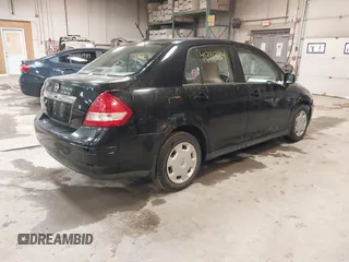 2007 Nissan Versa 1.8 SL with VIN 3N1BC11E47L411983, listed as a IAAI auction lot 41391334 with 201,830 mi miles. Bid and sale history available at carsss.com. Image 4.