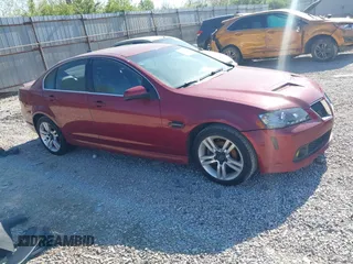 2009 Pontiac G8 z VIN 6G2ER57799L170338, wystawiony jako IAAI lot #42088706 z przebiegiem 157 582 mil mil oraz . Historia ofert i sprzedaży dostępna na DreamBid. Obrazek 1.