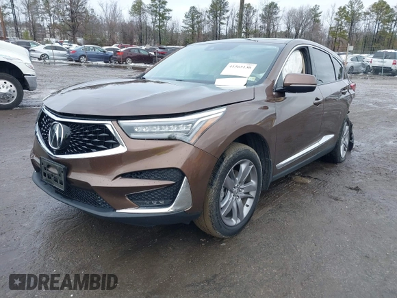 2019 Acura RDX w/Advance Pkg with VIN 5J8TC2H75KL017199, listed as a IAAI auction lot 41565130 with 67,880 mi miles. Bid and sale history available at carsss.com. Image 2.