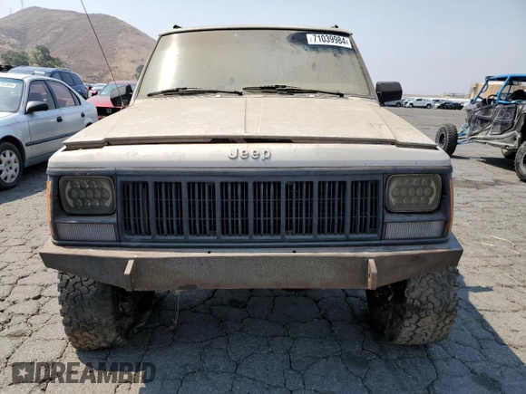 1996 Jeep Cherokee Sport with VIN 1J4FJ68S4TL146513, listed as a Copart auction lot 71039984 with 330,765 mi miles and Clean Title. Bid and sale history available at carsss.com. Image 5.