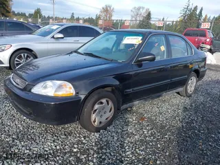 1997 Honda Civic EX with VIN 2HGEJ8542VH520783, listed as a IAAI auction lot 40744085 with 155,772 mi miles. Bid and sale history available at carsss.com. Image 2.