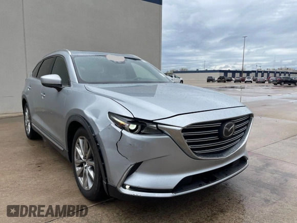 2017 Mazda CX-9 Grand Touring with VIN JM3TCADY7H0136915, listed as a Copart auction lot 57106855 with 135,872 mi miles and Clean title. Bid and sale history available at DreamBid. Image 1.