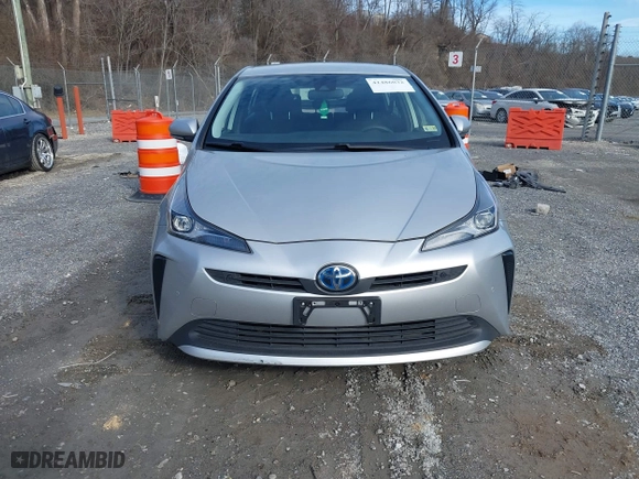 2021 Toyota Prius L Eco with VIN JTDKAMFU7M3143961, listed as a IAAI auction lot 41486032 with 58,979 mi miles. Bid and sale history available at carsss.com. Image 12.