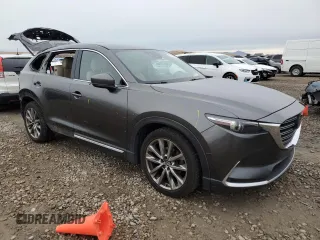 2017 Mazda CX-9 Grand Touring with VIN JM3TCBDYXH0143217, listed as a Copart auction lot 81388264 with 130,381 mi miles and Salvage Title. Bid and sale history available at carsss.com. Image 4.
