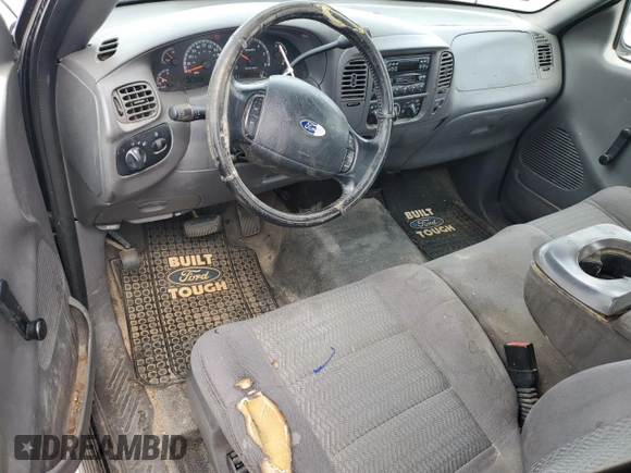 2003 Ford F-150 XL с VIN 1FTRX17273NB20966, выставлен на аукционе Copart как лот 53798005 с пробегом 217 855 миль миль и Списание • Salvage title. История ставок и продаж доступна на DreamBid. Изображение 8.