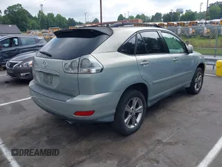 2006 Lexus RX 400h with VIN JTJHW31U260024648, listed as a IAAI auction lot 42632917 with 246,808 mi miles and . Bid and sale history available at DreamBid. Image 4.